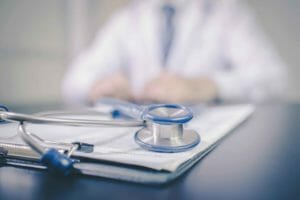 doctor's stethoscope and clipboard